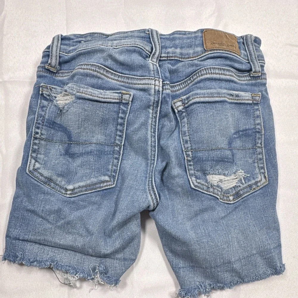 American Eagle Next Level Stretch Women's Distressed Denim Cut Off Shorts 0 Blue